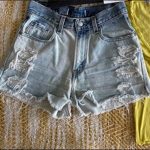Vintage Levi’s Bleached distressed denim shorts